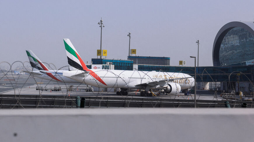 FILE PHOTO: Planes are parked at Terminal 3 of the Dubai International Airport, following the United States and Israel strikes on Iran, in Dubai, United Arab Emirates, March 2, 2026. REUTERS/Raghed Waked/File Photo
