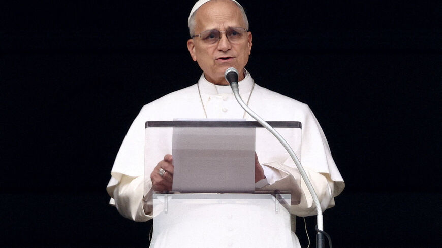 FILE PHOTO: Pope Leo XIV leads the Angelus prayer from the window of the Apostolic Palace at the Vatican, March 1, 2026. REUTERS/Guglielmo Mangiapane/File Photo