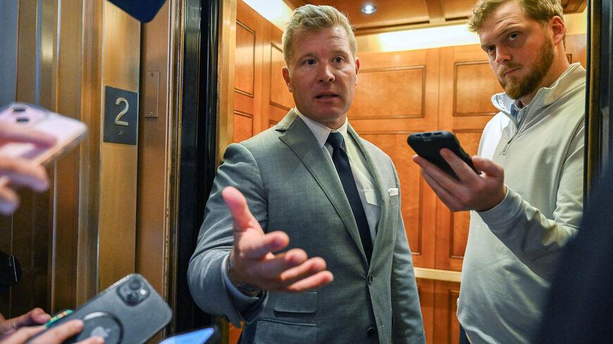 FILE PHOTO: U.S. Senator Tim Sheehy (R-MT) speaks to the media, after a Senate GOP lunch, as Republican lawmakers struggle to pass U.S. President Donald Trump’s sweeping spending and tax bill, on Capitol Hill in Washington, D.C., U.S., June 28, 2025. REUTERS/Annabelle Gordon/File Photo