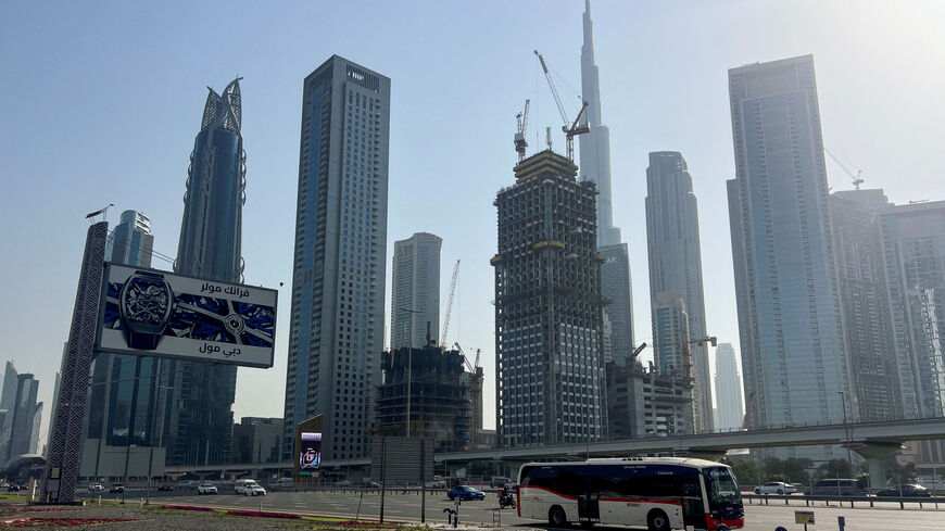 FILE PHOTO: Vehicles drive along a highway, amid the U.S.-Israeli conflict with Iran, in Dubai, United Arab Emirates, March 4, 2026. Picture taken with a mobile phone. REUTERS/Rula Rouhana/File Photo
