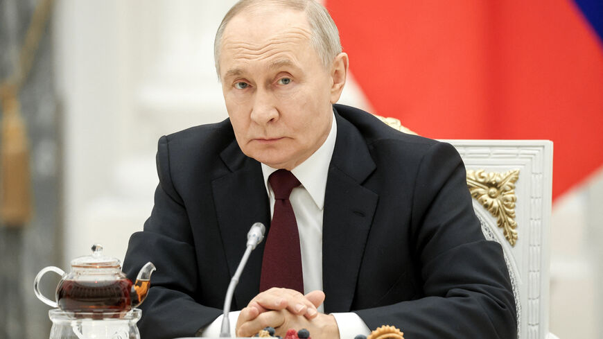 Russian President Vladimir Putin attends a meeting with women representing various professional fields to congratulate them on the upcoming International Women's Day at the Kremlin in Moscow, Russia March 5, 2026. Sputnik/Valeriy Sharifulin/Pool via REUTERS