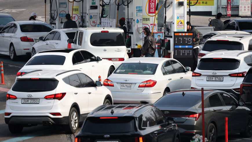 Cars line up at a gas station in Seoul, South Korea, March 9, 2026.   REUTERS/Kim Hong-Ji