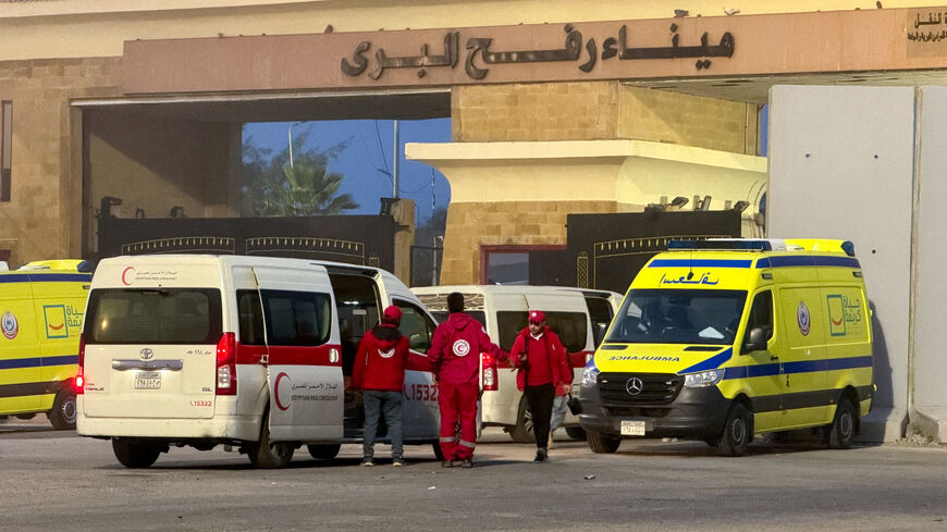 FILE PHOTO: Egyptian ambulances go through the Rafah border crossing on the Egyptian side in Rafah, Egypt, February 10, 2026. Picture taken with a mobile phone. REUTERS/Stringer/File Photo