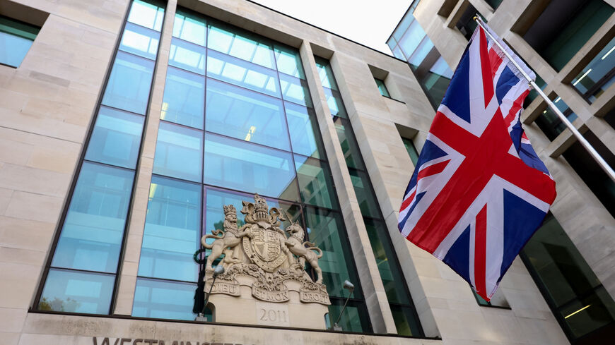FILE PHOTO: A Union Jack is flown outside Westminster Magistrates' Court, in London, Britain, November 4, 2025. REUTERS/Hannah McKay/File Photo