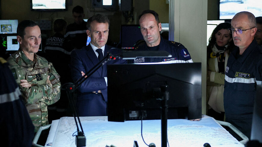 French President Emmanuel Macron visits the bridge of the French aircraft carrier Charles de Gaulle, on the day of his visit to Cyprus, showing France's solidarity after recent drone attacks amid the U.S.-Israeli conflict with Iran, and aimed at reinforcing European security in the Eastern Mediterranean, on the Mediterranean Sea. REUTERS/Gonzalo Fuentes/Pool