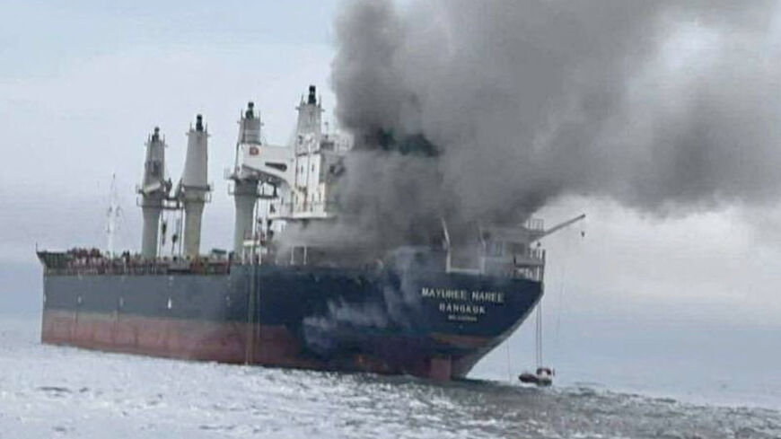 The Thailand-flagged cargo ship Mayuree Naree engulfed in black smoke in the Strait of Hormuz, March 11, 2026. ROYAL THAI NAVY/Handout via REUTERS