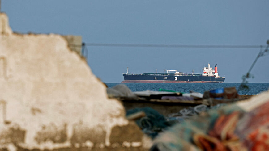 FILE PHOTO: A LPG gas tanker sits anchored as the traffic is down in the Strait of Hormuz, amid the U.S.-Israeli conflict with Iran, in Shinas, Oman, March 11, 2026. REUTERS/Benoit Tessier/File Photo