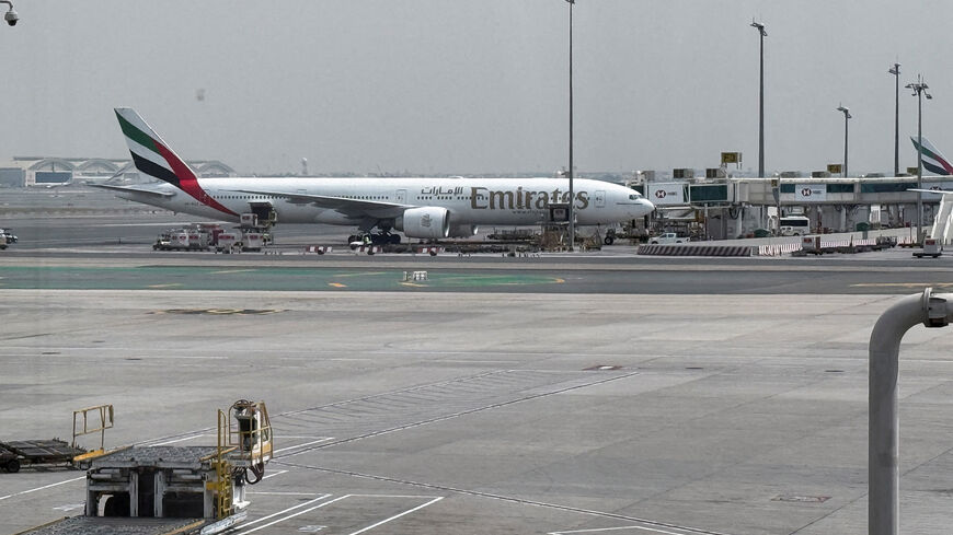 An Emirates airplane at Dubai International Airport, amid the U.S.-Israeli conflict with Iran, in Dubai, United Arab Emirates, March 8, 2026. Picture taken by phone. REUTERS/Stringer