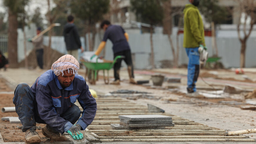A person works during an expansion of a cemetery in Behesht-e Zahra, amid the U.S.-Israeli conflict with Iran, in Tehran, Iran, March 16, 2026. REUTERS/Alaa Al-Marjani