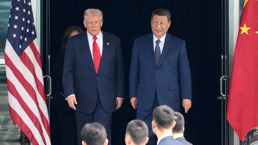 U.S. President Donald Trump and Chinese President Xi Jinping walk as they leave after a bilateral meeting at Gimhae International Airport, on the sidelines of the Asia-Pacific Economic Cooperation (APEC) summit, in Busan, South Korea, October 30, 2025. REUTERS/Evelyn Hockstein