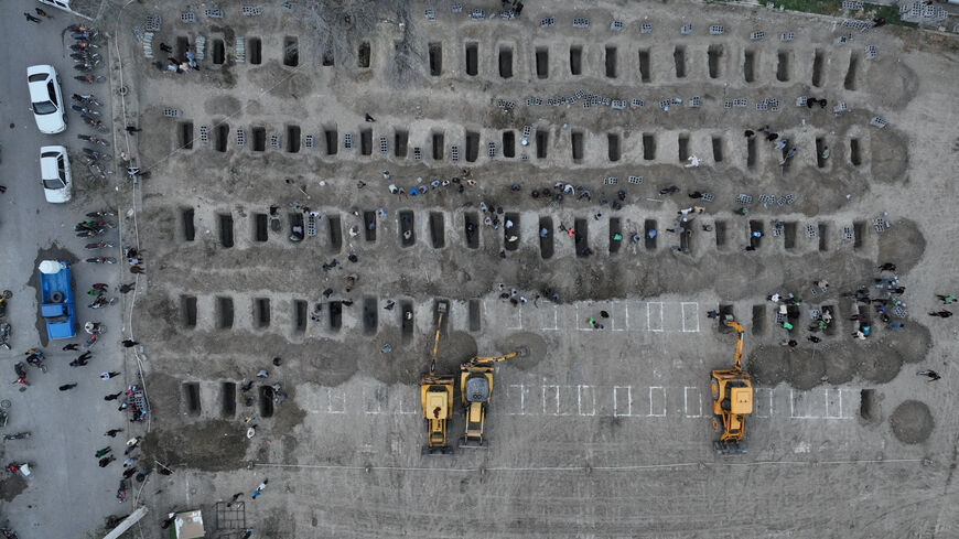 FILE PHOTO: Graves are being prepared for the victims following a reported strike on a school in Minab, Iran, March 2, 2026. Iranian Foreign Media Department/WANA (West Asia News Agency)/Handout via REUTERS/File Photo