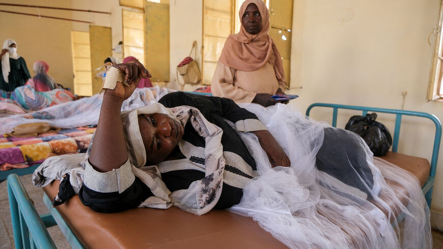 FILE PHOTO: Sudanese women lie in beds as they receive treatment for dengue fever at Omdurman Hospital, as Sudan grapples with outbreaks of dengue and cholera amid the annual rainy season and a collapsed healthcare and infrastructure system, in Khartoum, Sudan, September 23, 2025. REUTERS/El Tayeb Siddig/File Photo