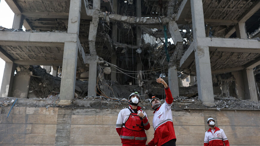 Red Crescent rescue team work at a building that was damaged by a strike, amid the U.S.-Israeli conflict with Iran, in Tehran, Iran, March 17, 2026. Majid Asgaripour/WANA (West Asia News Agency) via REUTERS