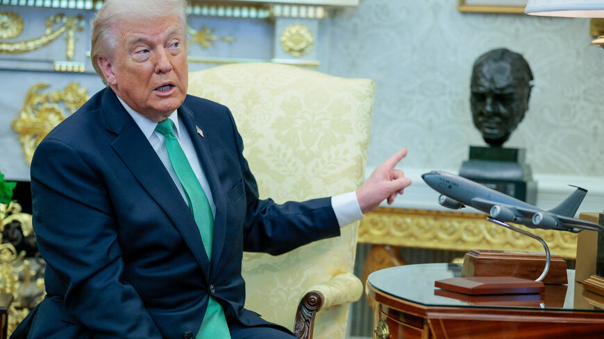 U.S. President Donald Trump gestures during a meeting with Irish Taoiseach (Prime Minister) Micheal Martin at the White House in Washington, D.C., U.S., March 17, 2026. REUTERS/Evan Vucci