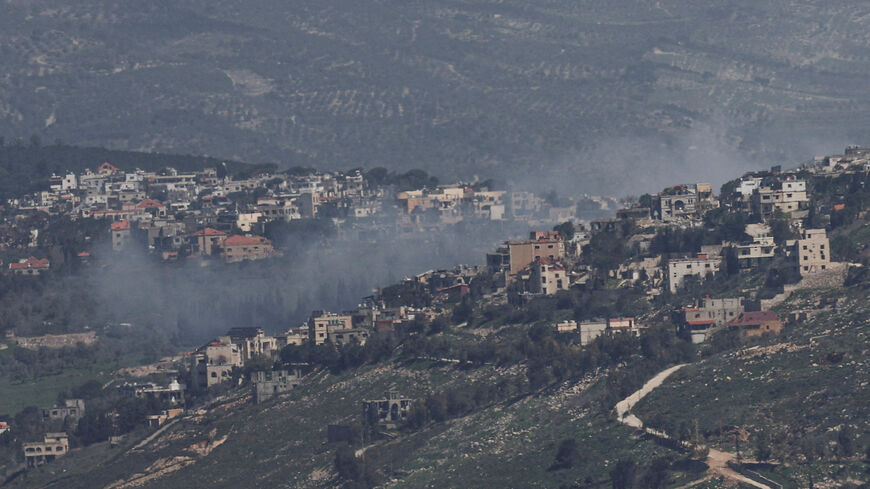 FILE PHOTO: Smoke rises from a Lebanese village near the border with Israel, amid escalation between Iran-backed Hezbollah and Israel, and amid the U.S.-Israeli conflict with Iran, as seen from northern Israel, March 19, 2026. REUTERS/Tyrone Siu/File Photo