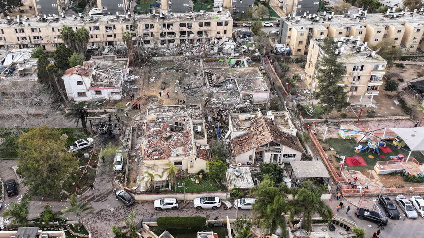 A drone view shows a damage in a residential neighbourhood, following a night of Iranian missile strikes which injured dozens of Israelis, amid the U.S.-Israel conflict with Iran, in Dimona, southern Israel March 22, 2026. REUTERS/Roei Kastro
