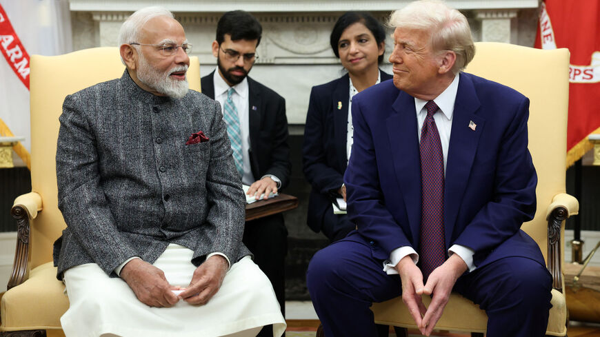 FILE PHOTO: U.S. President Donald Trump meets with Indian Prime Minister Narendra Modi at the White House in Washington, D.C., U.S., February 13, 2025. REUTERS/Kevin Lamarque/File Photo
