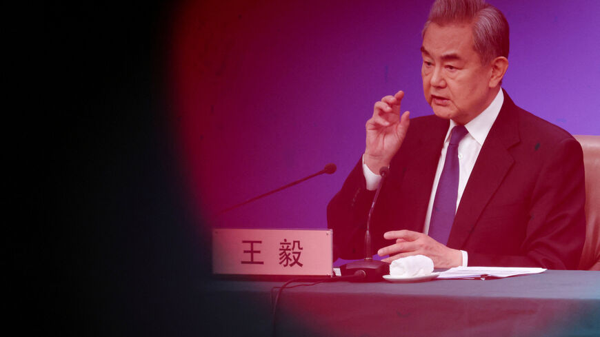 Chinese Foreign Minister Wang Yi speaks during a press conference on the sidelines of the National People's Congress (NPC), in Beijing, China, March 8, 2026. REUTERS/Maxim Shemetov