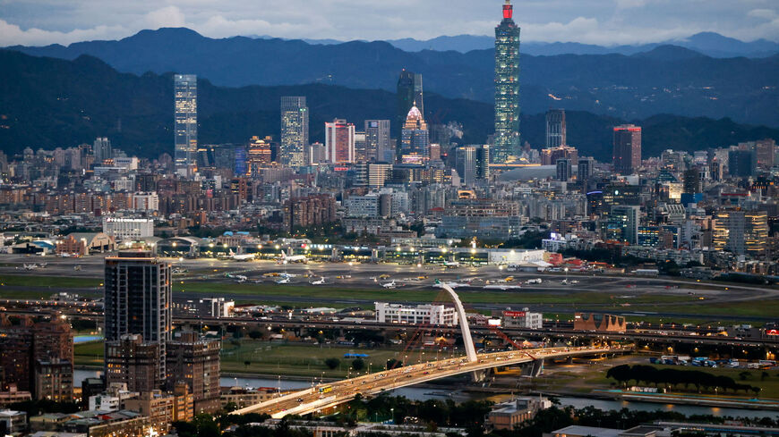 A general view shows Taipei city skyline, including the Taipei 101 skyscraper, with Songshan Airport in the foreground in Taipei, Taiwan February 23, 2026. REUTERS/Ann Wang