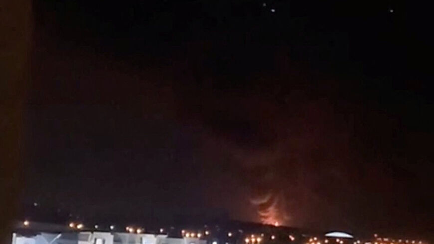 Smoke and fire rise in the direction of the fuel tank at Kuwait International Airport, following a drone strike amid the U.S.-Israeli conflict with Iran, in Al-Dajeej, Kuwait, March 25, 2026, in this still image obtained from a social media video. Social Media/via REUTERS