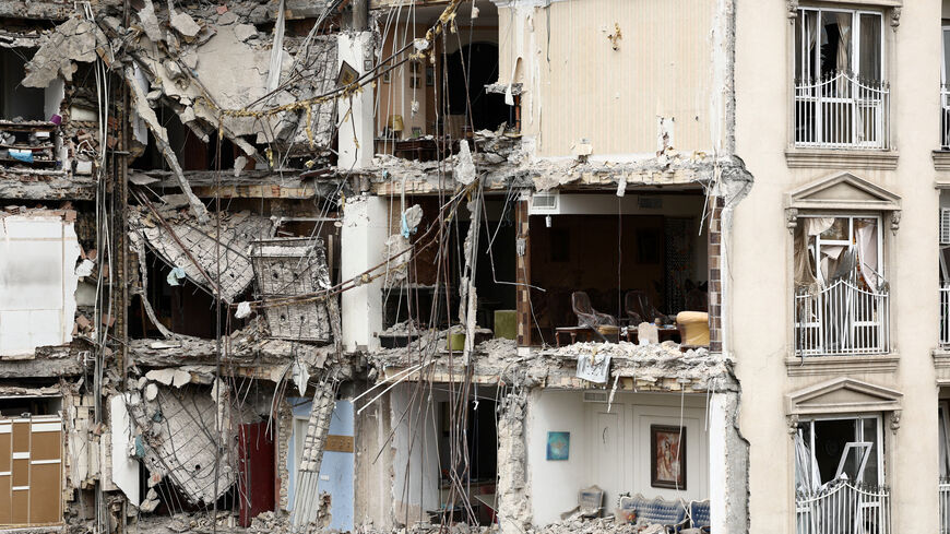 A view of a residential building damaged by a strike, amid the U.S.-Israeli conflict with Iran, in Tehran, Iran, March 23, 2026. Majid Asgaripour/WANA (West Asia News Agency) via REUTERS ATTENTION EDITORS - THIS PICTURE WAS PROVIDED BY A THIRD PARTY     TPX IMAGES OF THE DAY