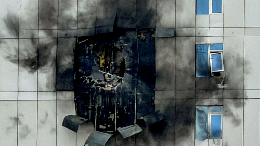 FILE PHOTO: A building that was damaged by an Iranian drone attack, after Israel and the U.S. launched strikes on Iran, in Juffair, Manama, Bahrain, March 1, 2026. REUTERS/Hamad I Mohammed/File Photo