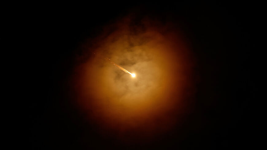 An Iranian missile flies towards Israel, amid the U.S.-Israeli conflict with Iran, as seen from Hebron, in the Israeli-occupied West Bank, March 28, 2026. REUTERS/Mussa Qawasma