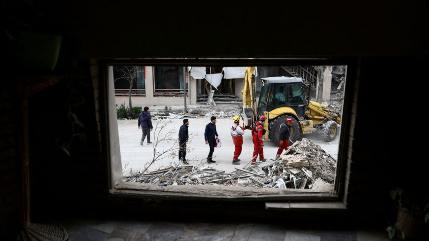 Emergency responders work at a site of the Qatari Al-Araby TV and business building damaged by a strike, as the U.S.-Israeli conflict with Iran continues, in Tehran, Iran, March 29, 2026. Majid Asgaripour/WANA (West Asia News Agency) via REUTERS