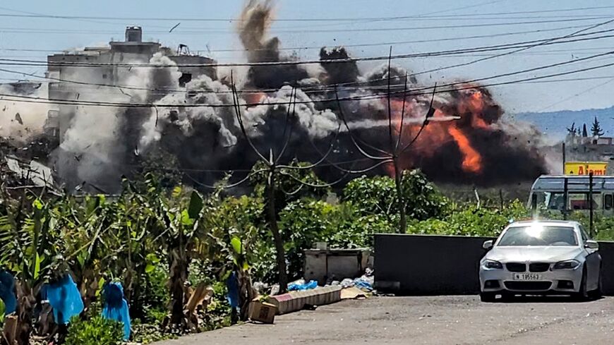 An explosion erupts following an Israeli airstrike on the village of Abbasiyeh in southern Lebanon on March 10, 2026