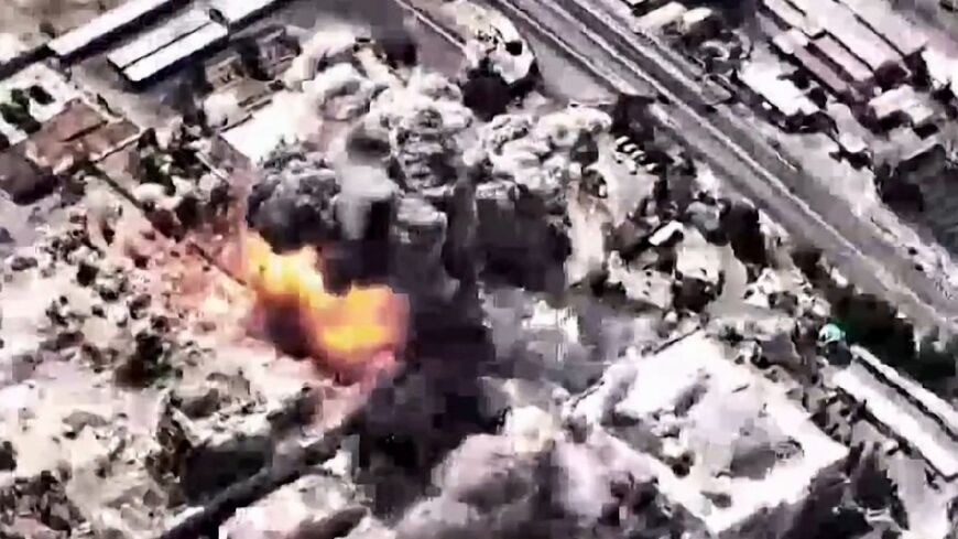 A video grab image taken from footage released by the Israeli military on March 1, 2026, shows what it says are large-scale strikes on "the headquarters of the Iranian terror regime" in Tehran on March 1