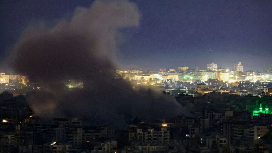 Smoke rises from the site of an Israeli airstrike in Beirut’s southern suburbs