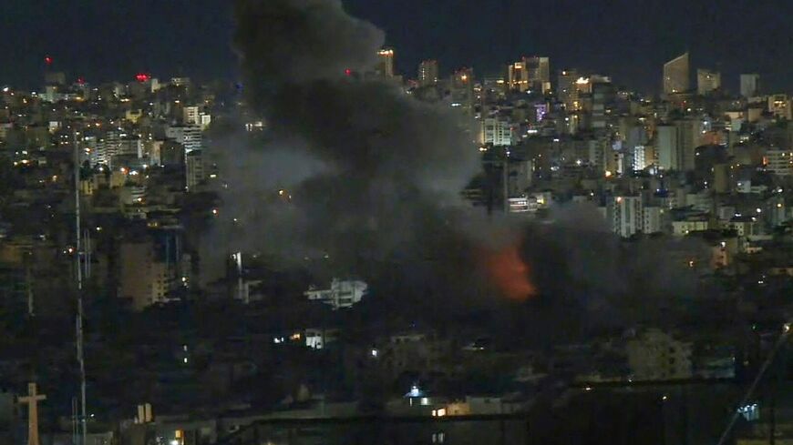 Plumes of smoke rising from the southern suburbs of Beirut, where Israel said it launched strikes