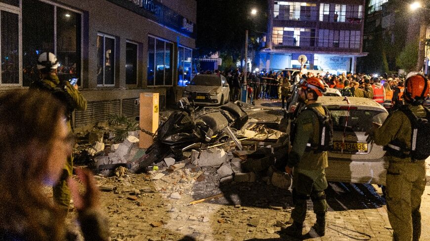 Israeli police say Iran likely hit the central city of Ramat Gan with cluster munitions