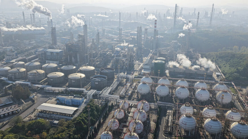An aerial view shows a petrochemical plant in operation by the Yangtze River in Nanjing, in eastern China's Jiangsu province November 26, 2025. (Photo by CN-STR / AFP via Getty Images) / China OUT