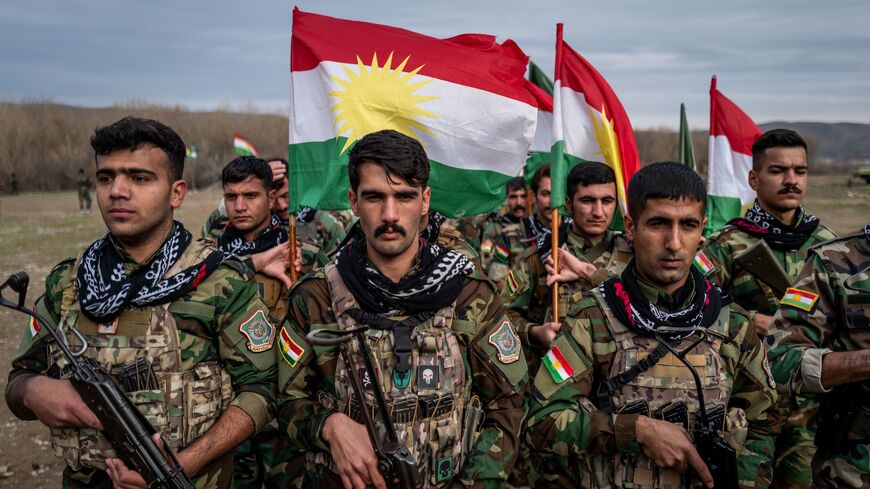 Kurdish Peshmerga fighters affiliated with PAK train on Jan. 18, 2026, near Erbil, Iraq. 