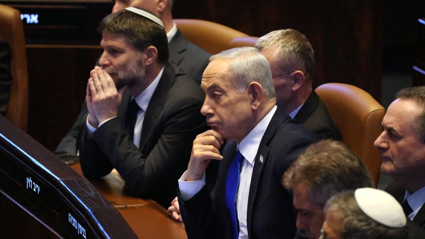 Israel's Prime Minister Benjamin Netanyahu (C) listens to a speech by his Indian counterpart Narendra Modi at the Israeli parliament, the Knesset, Jerusalem, Feb. 25, 2026.