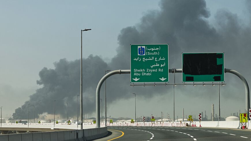 A plume of smoke rises from the port of Jebel Ali following a reported Iranian strike in Dubai on March 1, 2026. 