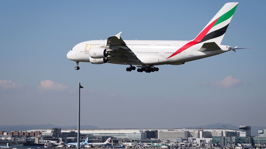  An Emirates passenger plane is landing at Frankfurt Airport from Dubai International on March 3, 2026, in Frankfurt, Germany. 