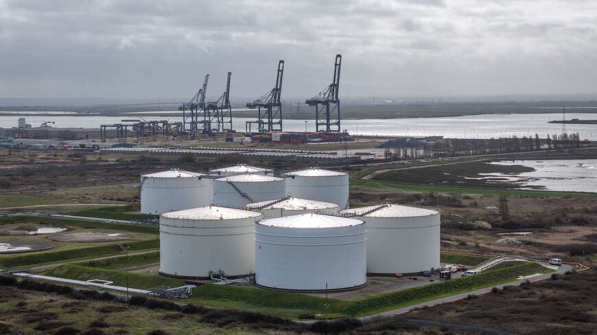 In this aerial view, Storage tanks at Grain LNG importation terminal, operated by National Grid Plc sit near the River Medway in the Thames Estuary on March 12, 2026, in Isle of Grain, England. 
