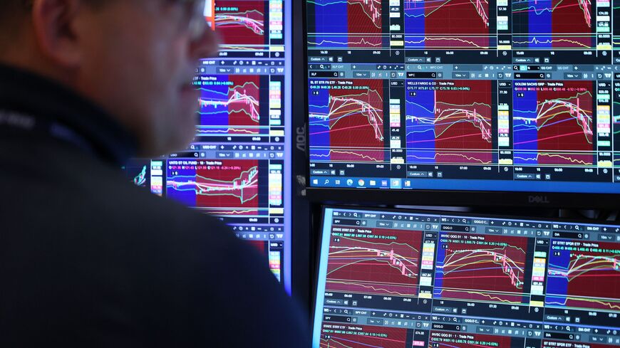 NEW YORK, NEW YORK - MARCH 18: Traders work on the floor of the New York Stock Exchange during morning trading on March 18, 2026 in New York City. Stocks continued to slide at opening amid an interest rate decision by the Federal Reserve and a release of producer price index that showed wholesale prices rose more than expected in February. (Photo by Michael M. Santiago/Getty Images)