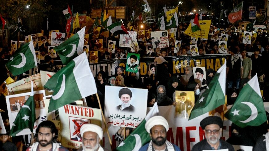 Pakistani Shiite Muslims shout slogans to condemn the US-Israel attack on Iran during a protest in Karachi on February 28, 2026.