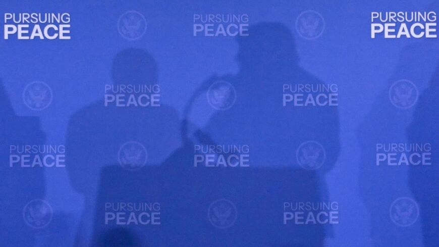 The shadows of US President Donald Trump and Russian President Vladimir Putin seen at their 2025 summit in Anchorage