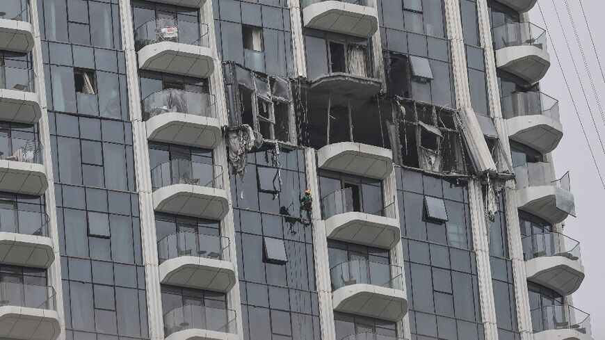 Iran's drone attacks on neighbouring countries include the United Arab Emirates, where this strike damaged a building in Dubai