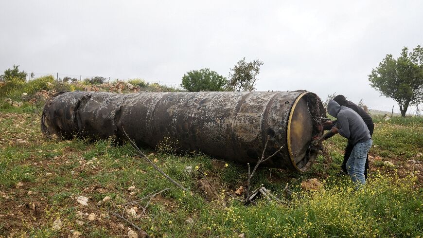 Remnants of an missile that landed in the Israeli-occupied West Bank village of Beitin on March 26, 2026