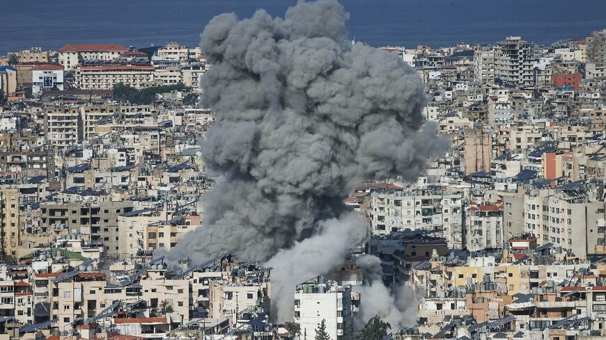 Smoke rises from the site of an Israeli air strike in the southern suburbs of Beirut