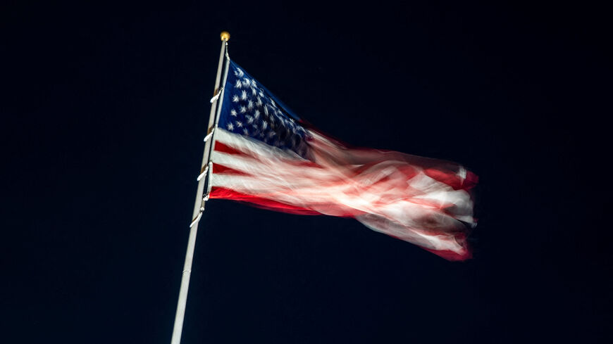 An American flag flutters on the South Lawn ahead of U.S. President Donald Trump's arrival at the White House, after Israel and the U.S. launched strikes on Iran, in Washington, D.C., U.S., March 1, 2026. REUTERS/Nathan Howard