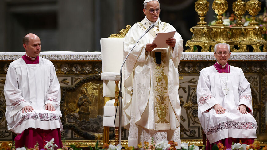 Pope Leo XIV leads the Easter Vigil in Saint Peter's Basilica at the Vatican, April 4, 2026. REUTERS/Guglielmo Mangiapane