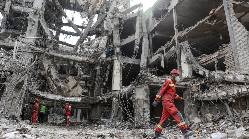 Emergency personnel work at the site of a strike, amid the U.S.-Israeli conflict with Iran, in Tehran, Iran, March 12, 2026. Majid Asgaripour/WANA (West Asia News Agency) via REUTERS