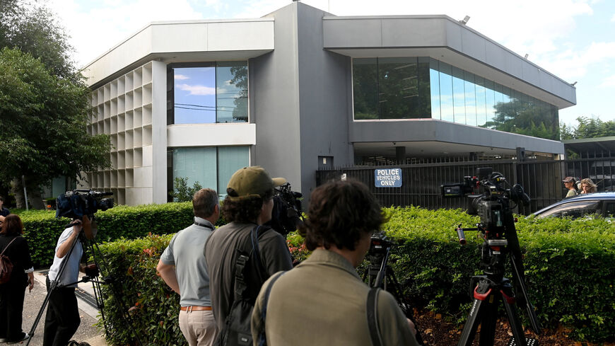 Members of the media wait outside Mascot Police Station after former SAS soldier Ben Roberts-Smith was charged with alleged war crimes committed in Afghanistan, in Sydney, Australia, April 7, 2026. REUTERS/Jeremy Piper