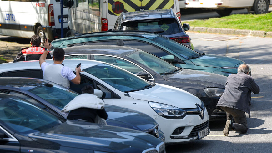 Police in action at the scene, after gunfire was heard near the building housing the Israeli consulate, according to a witness, in Istanbul, Turkey, April 7, 2026. REUTERS/Murad Sezer